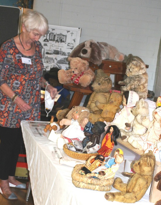 Shaelyn with dolls and teddies
